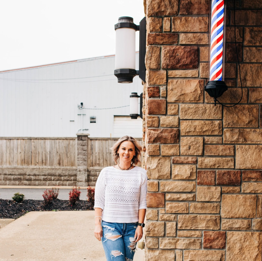 Angi outside Dirty Heads Barbershop